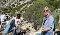(FOTO) Masovna akcija či&scaron;ćenja obale Risanskog akvatorijuma okupila vi&scaron;e od 120 volontera
