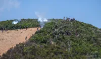 (FOTO/ VIDEO) Seuta kao ratna zona: Migranti lutaju ulicama, grad zatrpan smećem