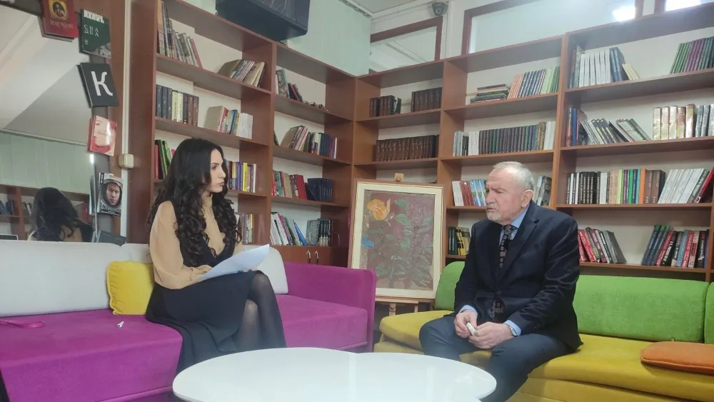 Бранко Радуловић и новинарка