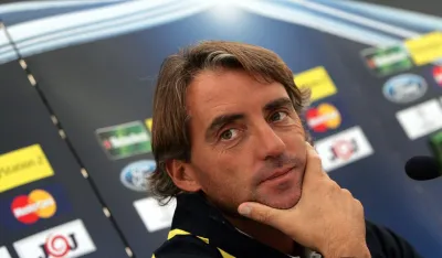 Inter Milan's head coach Roberto Mancini listens to journalists during a press conference prior his team's practice session at the Tehelne Pole stadium in Bratislava, September 12, 2005. Inter Milan will face Slovak FC Artmedia Bratislava in tomorrow's Group H first match.       REUTERS/Petr Josek