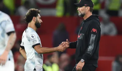 epa10134015 Manager Jurgen Klopp (R) and Mohamed Salah (L) of Liverpool after the English Premier League soccer match between Manchester United and Liverpool FC in Manchester, Britain, 22 August 2022. EPA-EFE/PETER POWELL EDITORIAL USE ONLY. No use with unauthorized audio, video, data, fixture lists, club/league logos or 'live' services. Online in-match use limited to 120 images, no video emulation. No use in betting, games or single club/league/player publications