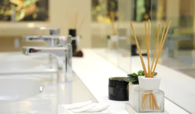 bathroom interior design - perfume ambience diffuser with wooden sticks.