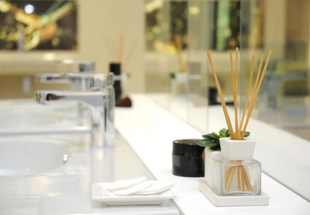 bathroom interior design - perfume ambience diffuser with wooden sticks.