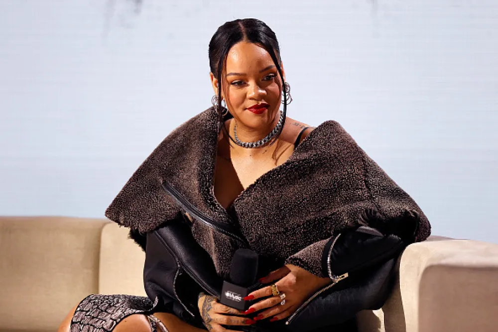 PHOENIX, ARIZONA - FEBRUARY 09: Rihanna speaks during the Super Bowl LVII Pregame & Apple Music Halftime Show press conference at Phoenix Convention Center on February 09, 2023 in Phoenix, Arizona. (Photo by Mike Lawrie/Getty Images)