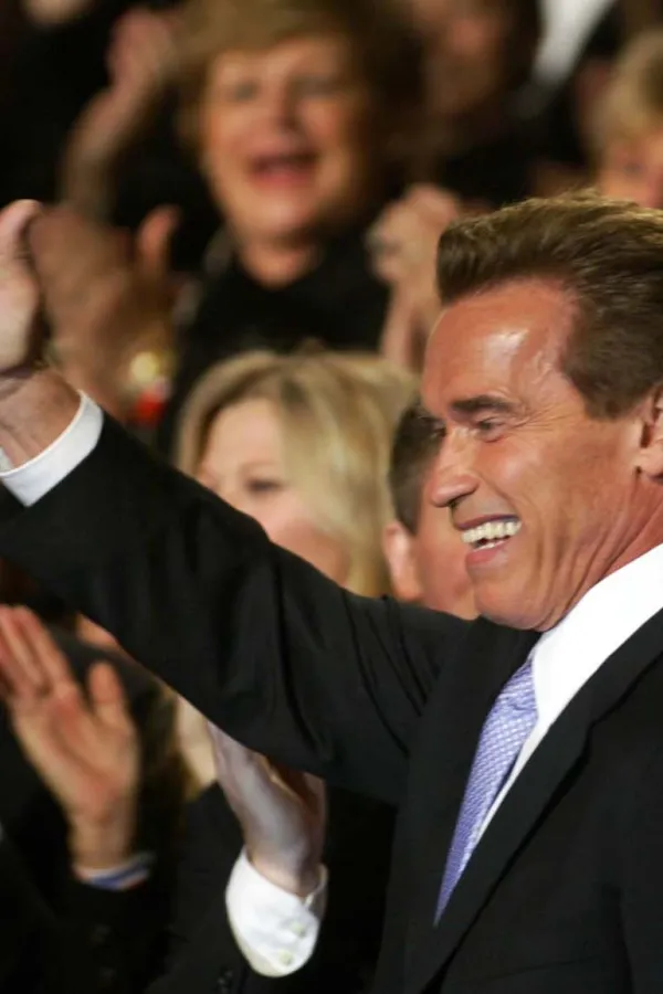 Republican Arnold Schwarzenegger enters a ballroom victory party following his victory in the California gubernatorial recall election in Los Angeles, Tuesday, Oct. 7, 2003. (AP Photo/Stephan Savoia)