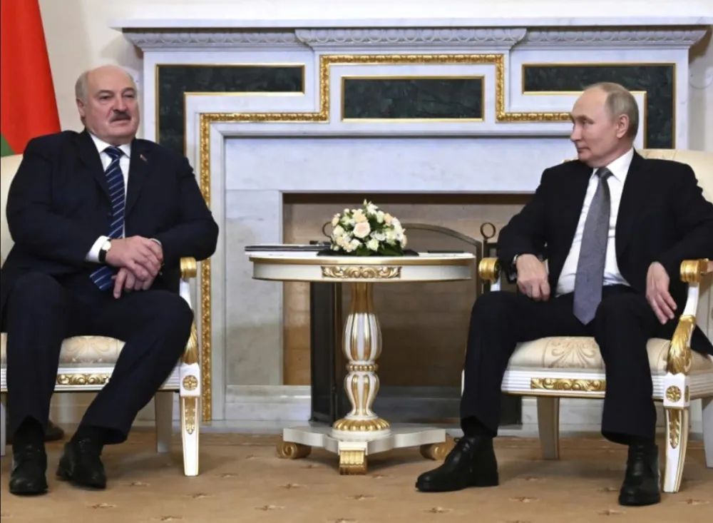 Aleksandar Luka&scaron;enko i Vladimir Putin