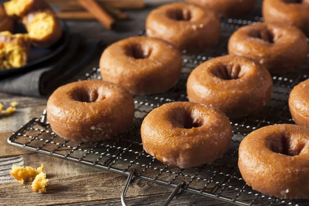 Homemade Glazed Autumn Pumpkin Donuts Ready to Eat