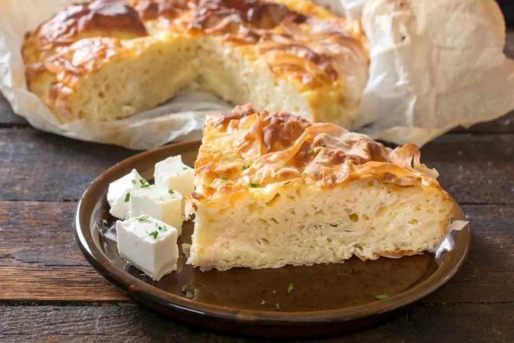 Slice of cheese pie called bure,selective focus