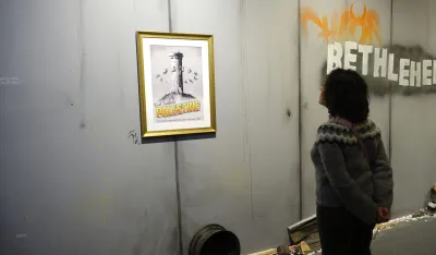 Banksyjevo djelo: "Visit historic Palestine. The Israeli army liked it so much they never left"