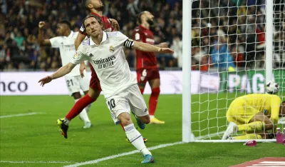epa10259408 Real Madrid's Luka Modric celebrates after scoring the 1-0 goal during the Spanish LaLiga soccer match between Real Madrid and Sevilla, in Madrid, Spain, 22 October 2022. EPA-EFE/Rodrigo Jimenez