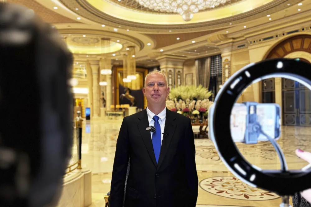 Kirill Dmitriev, the head of the Russian Direct Investment Fund, speaks to journalists at the Ritz Carlton hotel in Riyadh, Saudi Arabia, Tuesday, Feb. 18, 2025. (AP Photo/Baraa Anwer)