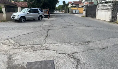 Stanovnici Ulice Iva Andrića traže hitnu rekonstrukciju: Asfalt sa hiljadu zakrpa