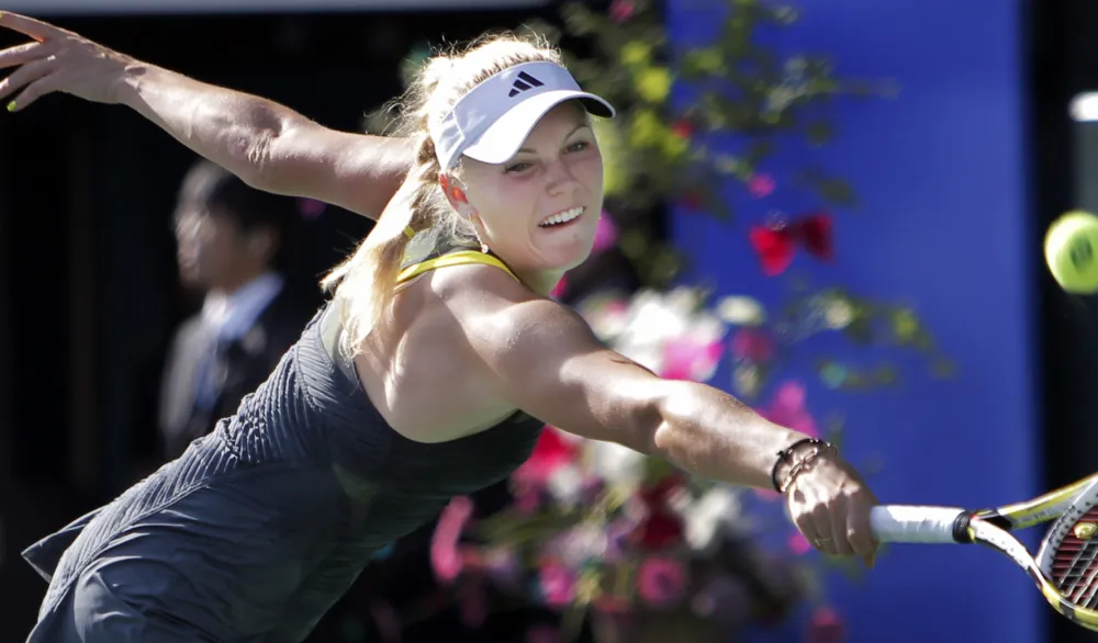 (FOTO) Biv&scaron;a prva teniserka svijeta pokazala izvajano tijelo u bikiniju &ndash; nakon tri porođaja