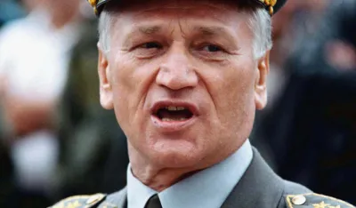FILE-This is file photo of Yugoslav army Chief of Staff Col. Gen. Momcilo Perisic during an airshow at Belgrade military airport June 14 1998. Yugoslav President Slobodan Milosevic fired Gen. Momcilo Perisic, following months of rumored dispute between the two, including the crisis in Kosovo. Perisic was appointed Chief of Staff in 1993, after serving as a commander of Serb forces fighting the Croats in CroatiaŐs 1991 war of secession. (AP PHOTO/Darko Vojinovic)