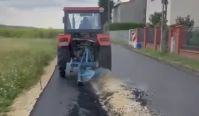 Traktoro izorao asfalt