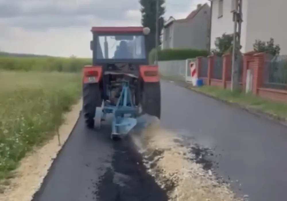 Traktoro izorao asfalt